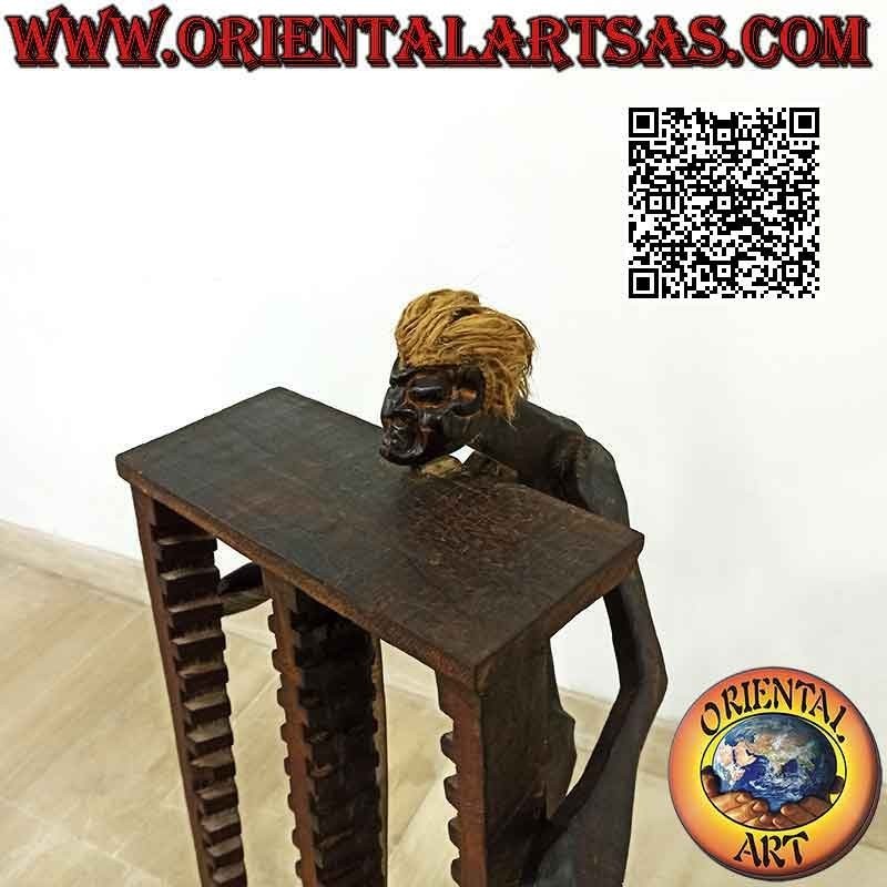 CD holder in primitive style with sculpture of an aboriginal in teak wood (80 cm)