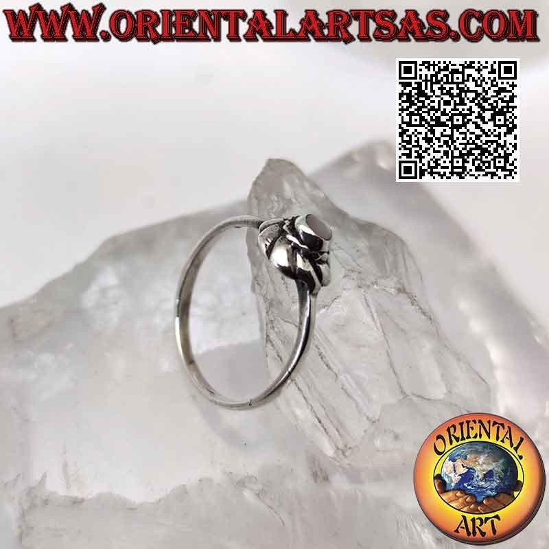 Silver ring with small round mother of pearl in the center of a vortex