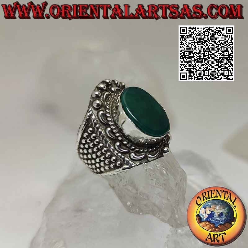 Wide band silver ring with large oval green agate with baroque crown and balls around