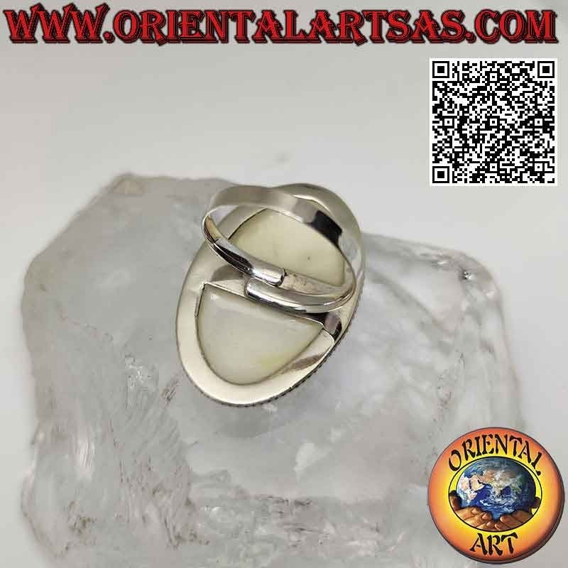 Silver ring with large oval mother-of-pearl surrounded by dense weaving (adjustable)