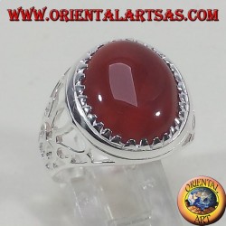 Silver ring carved with oval carnelian