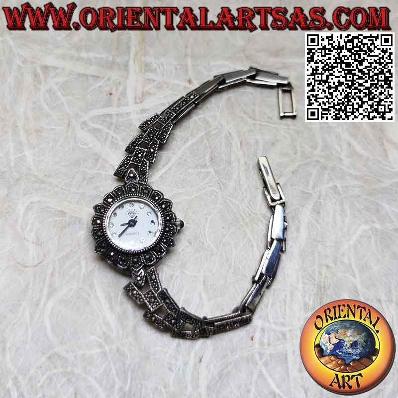 Runde Quarzuhr in 925 ‰ Silber mit trapezförmigem Armband, besetzt mit Markasit und Zirkonia auf dem Zifferblatt