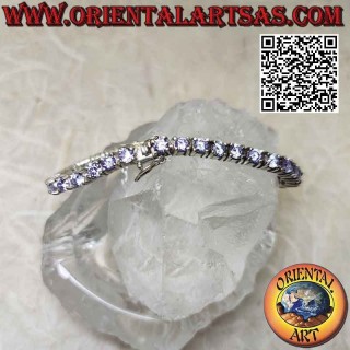 Tennisarmband in 925 ‰ Silber mit 4 mm gefassten lavendelfarbenen Zirkonen