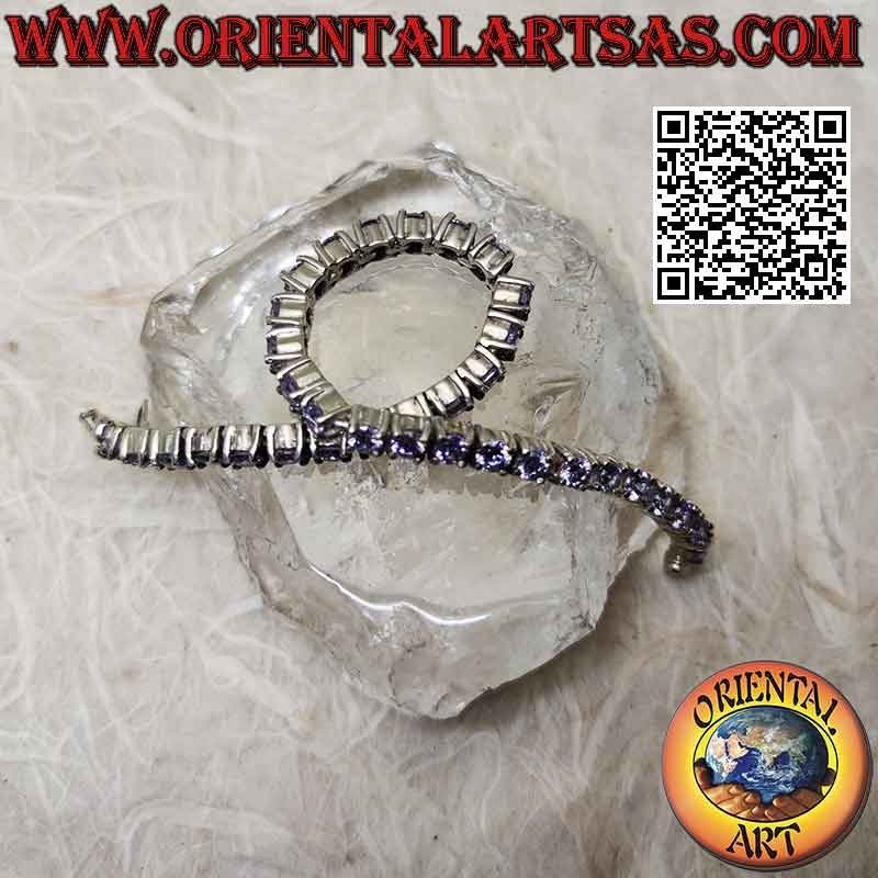 Tennisarmband in 925 ‰ Silber mit 4 mm gefassten lavendelfarbenen Zirkonen