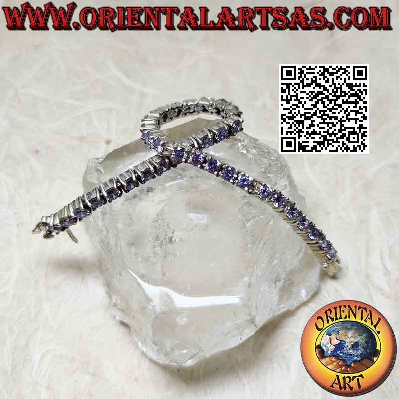 Tennisarmband in 925 ‰ Silber mit 4 mm gefassten lavendelfarbenen Zirkonen