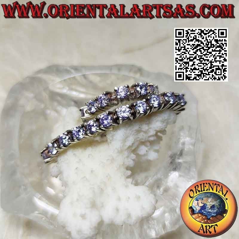 Tennisarmband in 925 ‰ Silber mit 4 mm gefassten lavendelfarbenen Zirkonen