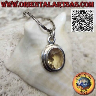 Silver pendant with natural oval yellow topaz on simple setting with sloping edge