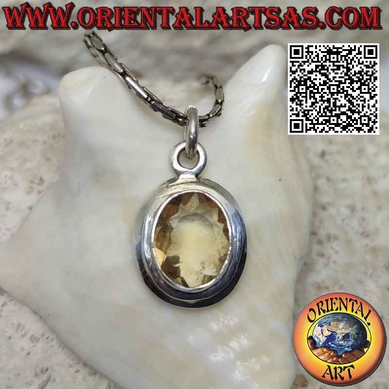 Silver pendant with natural oval yellow topaz on simple setting with sloping edge