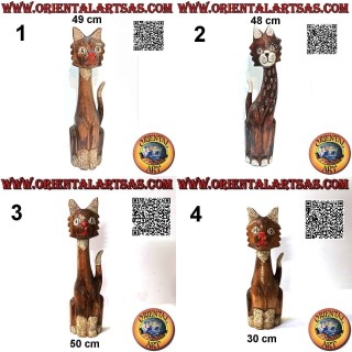 Sculpture of a seated cat made and decorated by hand in balsa wood
