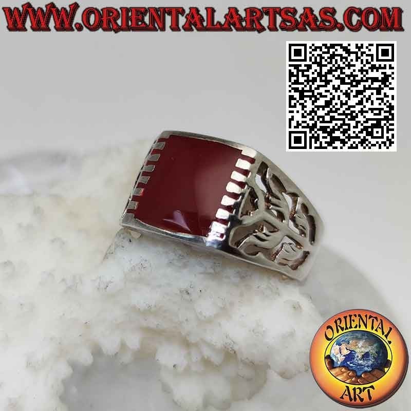 Silver ring with rectangular carnelian hooked laterally and curved motif on a perforated background