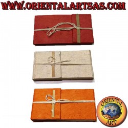 Carnet à fermeture trois...