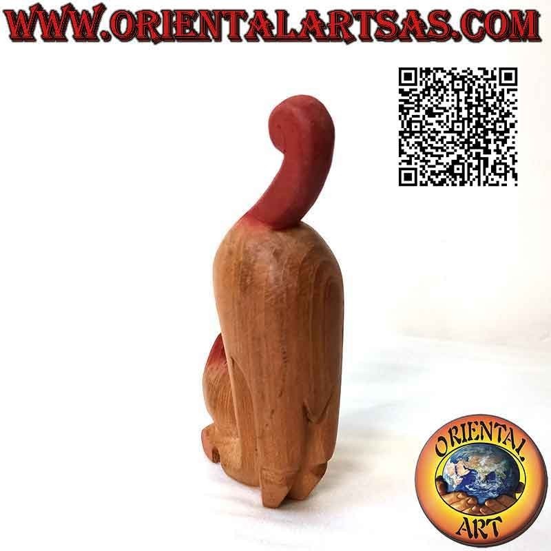 Thai cat sculpture in alert position, in teak wood