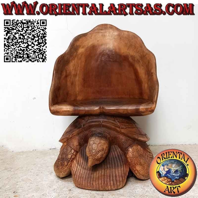 Poltroncina da salotto a scultura "scoglio su tartaruga", in legno di suar intagliata a mano