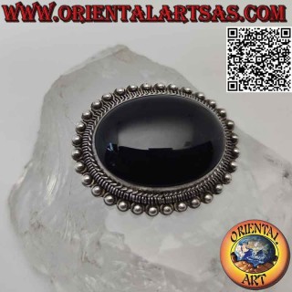 Broche de plata 925 ‰ con gran cabujón ovalado de ónix rodeado de entretejidos, anillos y bolitas
