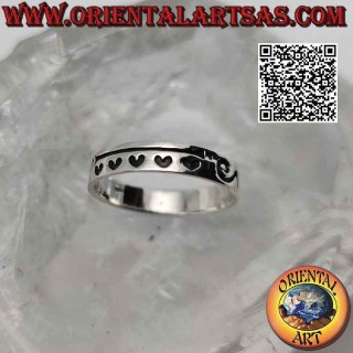 Smooth band silver ring with tribal decoration and deeply engraved hearts