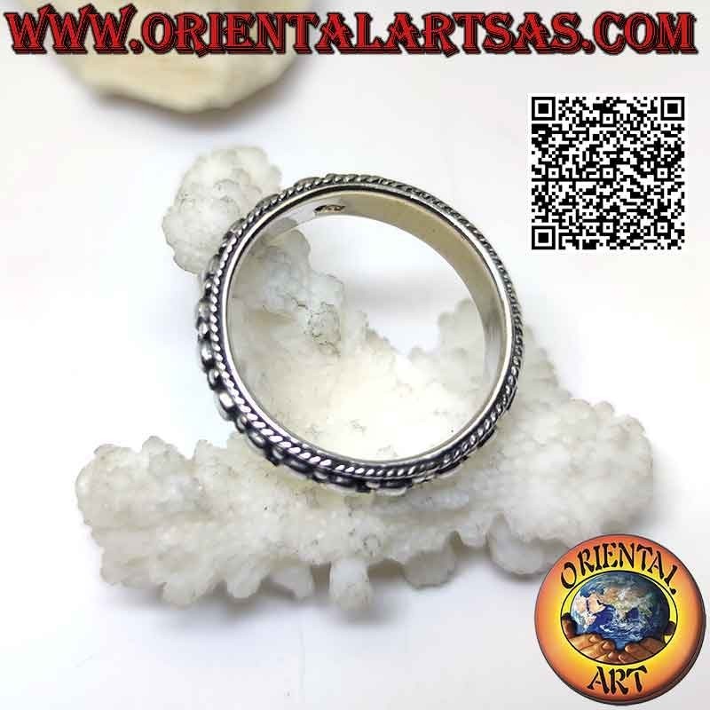 Silver ring with worked band with decoration of five balls in high relief