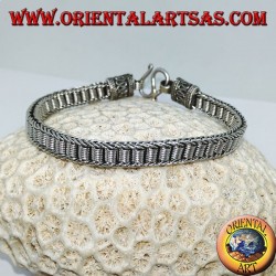 Bracelet plat en argent avec spirales centrales
