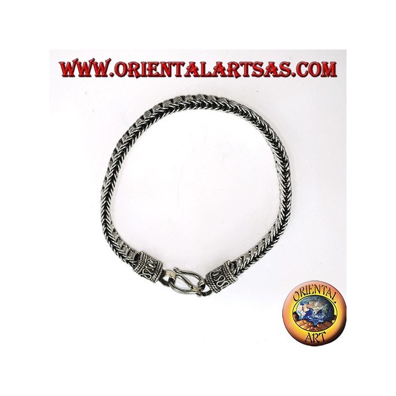 Flat silver bracelet with central spirals