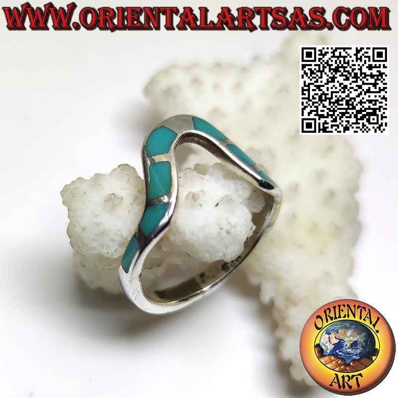 Anillo grande de plata con onda central e inserciones de turquesa