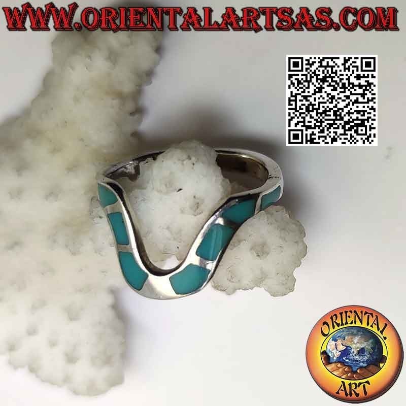 Anillo grande de plata con onda central e inserciones de turquesa