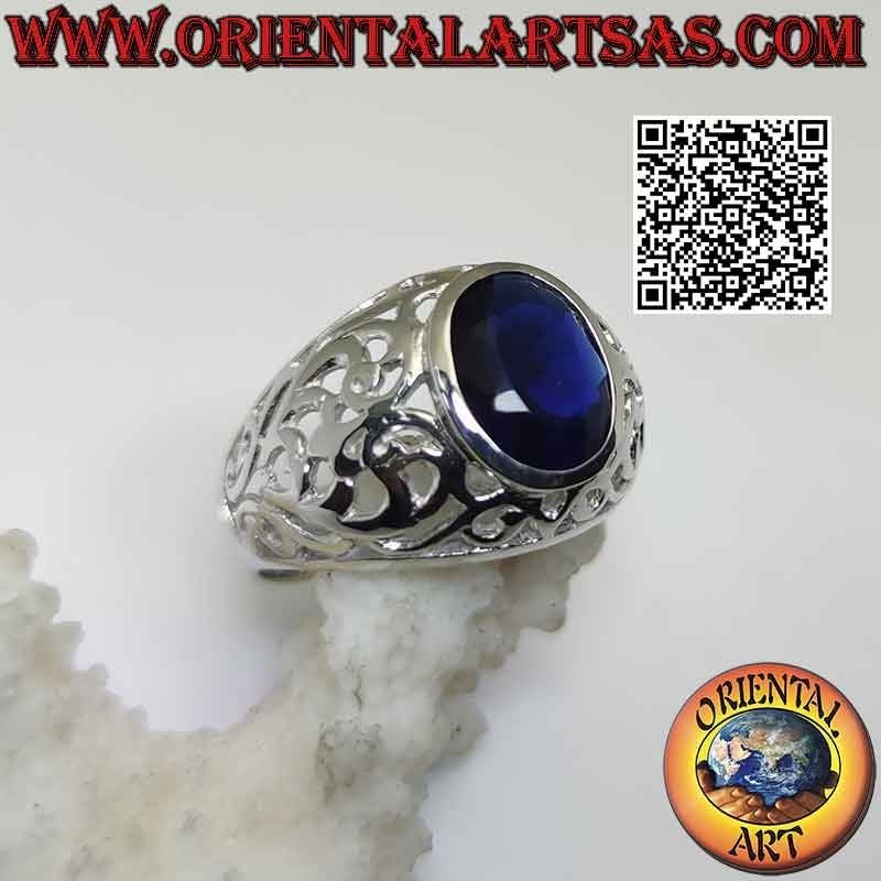 Silver ring with faceted oval synthetic sapphire and openwork romantic baroque decoration