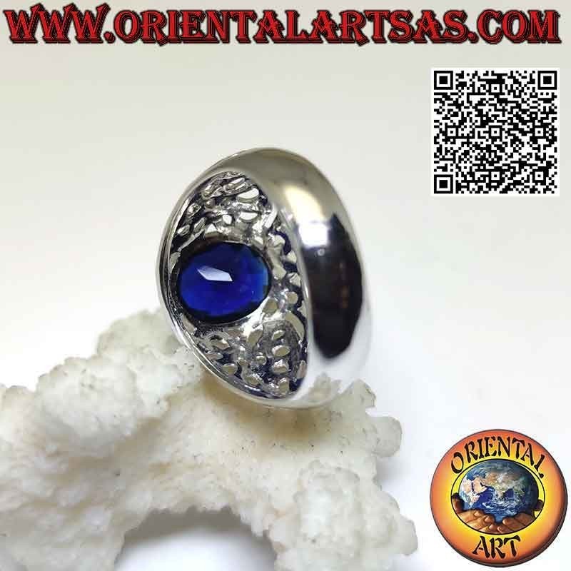Silver ring with faceted oval synthetic sapphire and openwork romantic baroque decoration