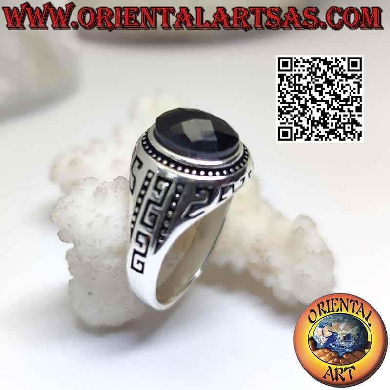 Silver ring with faceted oval spinel and Greek engraved on the sides