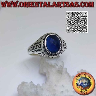Silver ring with faceted oval synthetic sapphire and engraved Greek on the sides