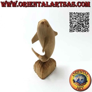 12 cm hibiscus wood sculpture of a dolphin posing on the cliff