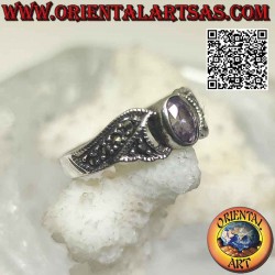 Silver ring with natural oval faceted amethyst and bands studded with marcasite on the sides