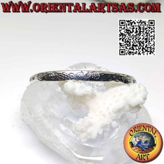 Bracciale rigido in argento 925‰ decoro maori simmetrico inciso e pallina terminale