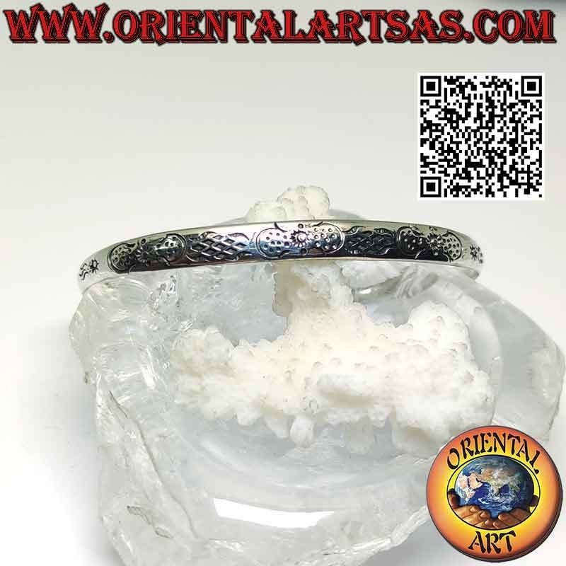 Pulsera rígida en plata 925‰ con decoración maorí simétrica grabada y bola terminal