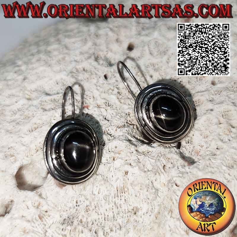 Boucles d'oreilles en argent avec étoile noire (étoile diopside) cabochon ovale haut entouré de trois lignes concentriques