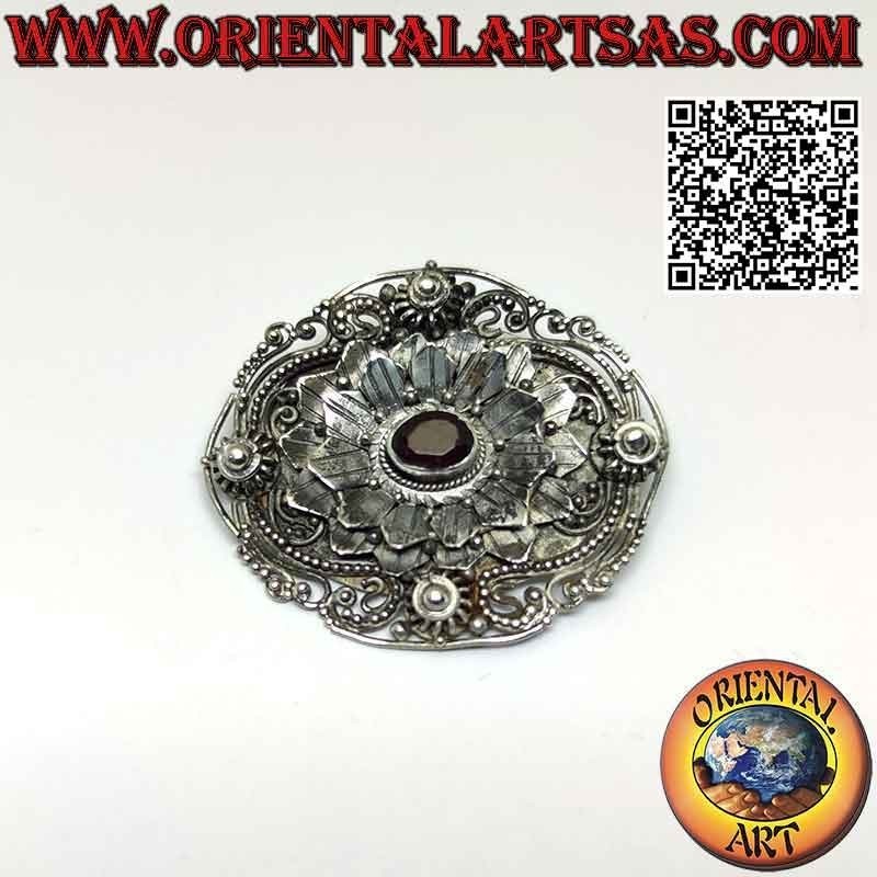 Big flower brooch in 925 ‰ silver with central oval natural garnet and detailed handmade decorations