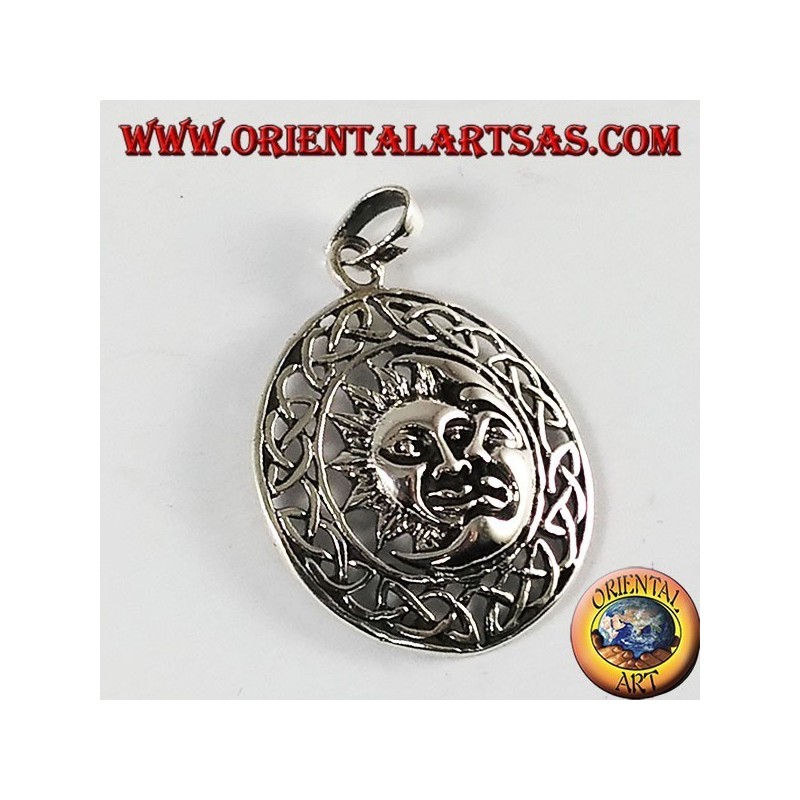 silver pendant, sun and moon in the Celtic wheel