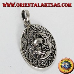 pendentif en argent, le soleil et la lune dans la roue celtique