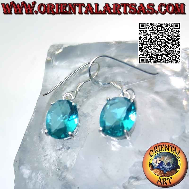 Boucles d'oreilles en argent avec topaze ovale à facettes sertie dans un double cadre lisse