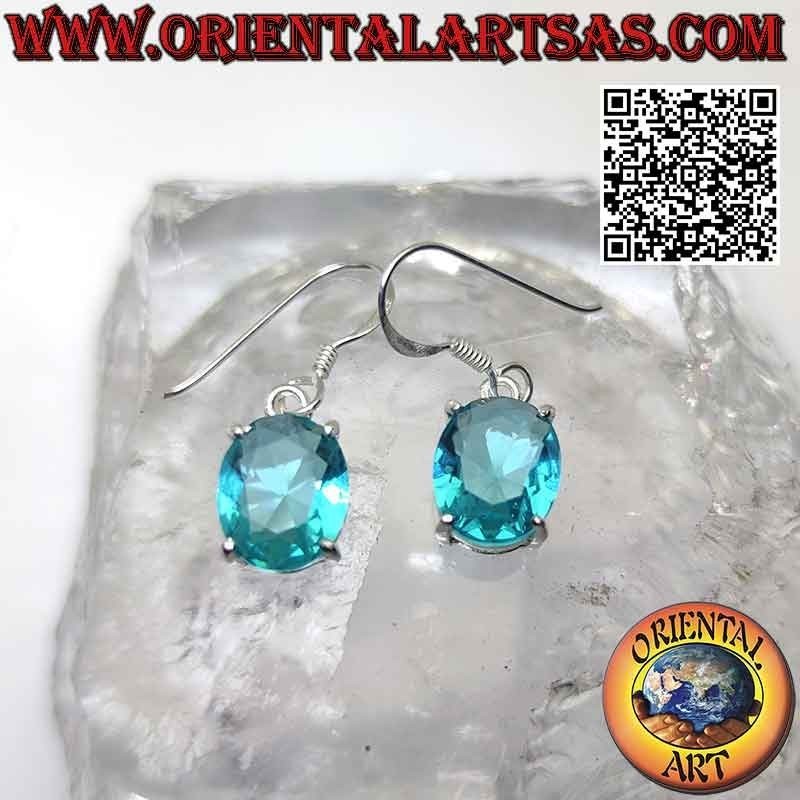 Boucles d'oreilles en argent avec topaze ovale à facettes sertie dans un double cadre lisse