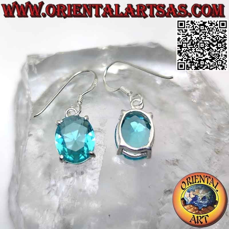 Boucles d'oreilles en argent avec topaze ovale à facettes sertie dans un double cadre lisse