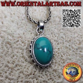 Silver pendant with oval cabochon turquoise surrounded by intertwining and smooth studded balls