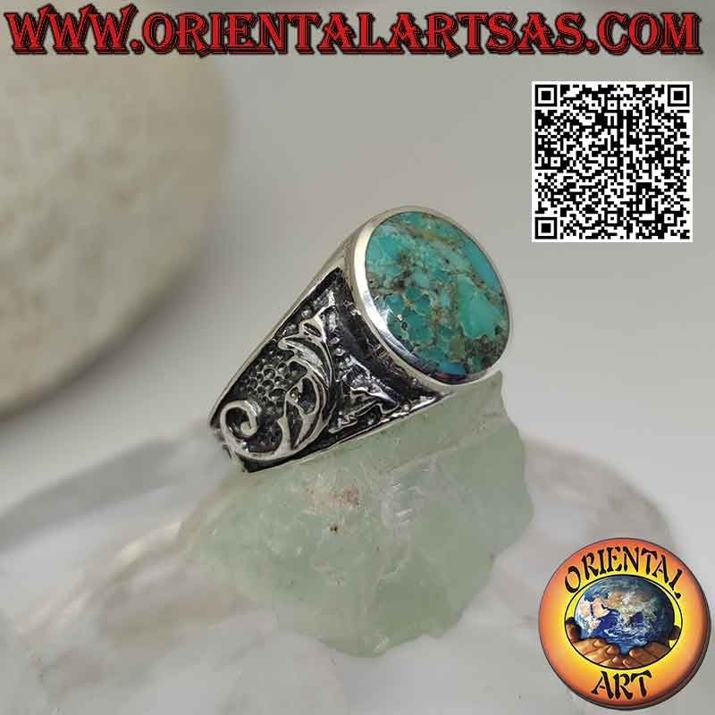 Anello in argento con turchese naturale dell'Arizona ovale e decoro floreale sui lati
