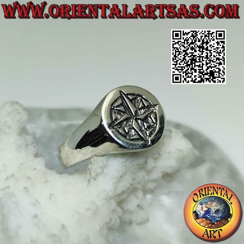 Smooth round silver ring with engraved "essential" wind rose