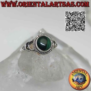 Silver ring with round cabochon malachite surrounded by interlacing and double U hook