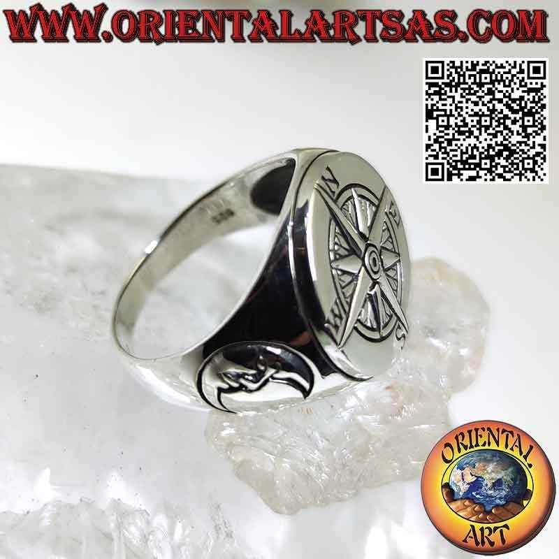 Smooth round silver ring with embossed wind rose and moon on the sides