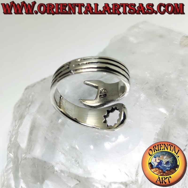 Smooth silver ring in the shape of a wrench with engravings