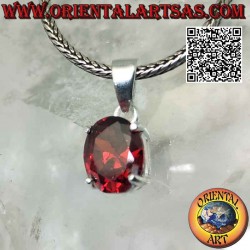 Silver pendant with oval faceted garnet set in a smooth double setting