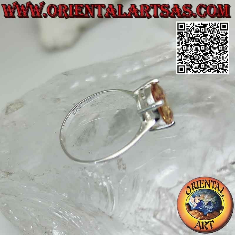 Silver ring with oval faceted champagne zircon set in a smooth double setting