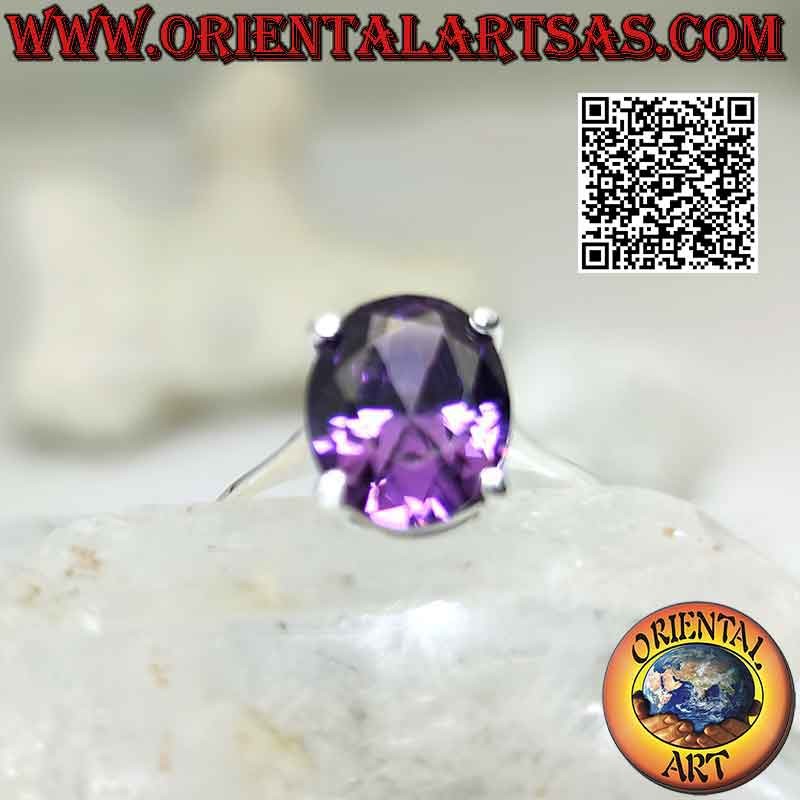 Silver ring with oval faceted synthetic amethyst set on double smooth setting