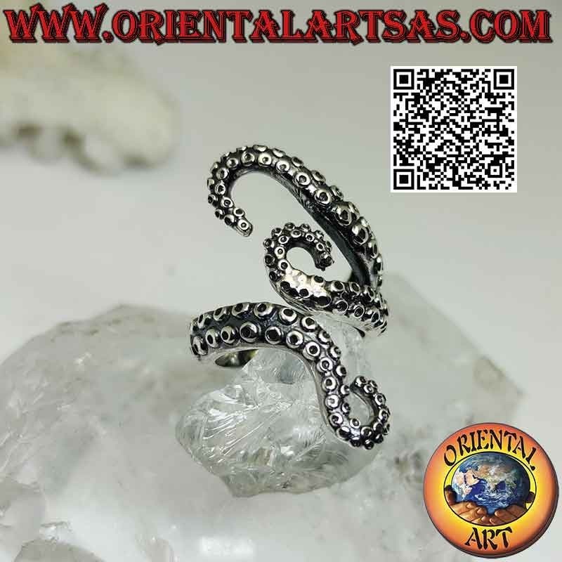 Silberring, die drei Tentakel des umhüllenden Oktopus (Oktopus) oder Oktopus
