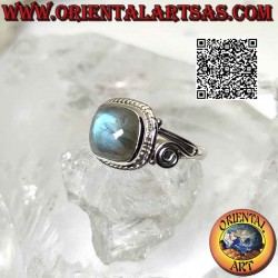 Silver ring with cabochon labradorite surrounded by interweaving and asymmetrical spiral on the sides